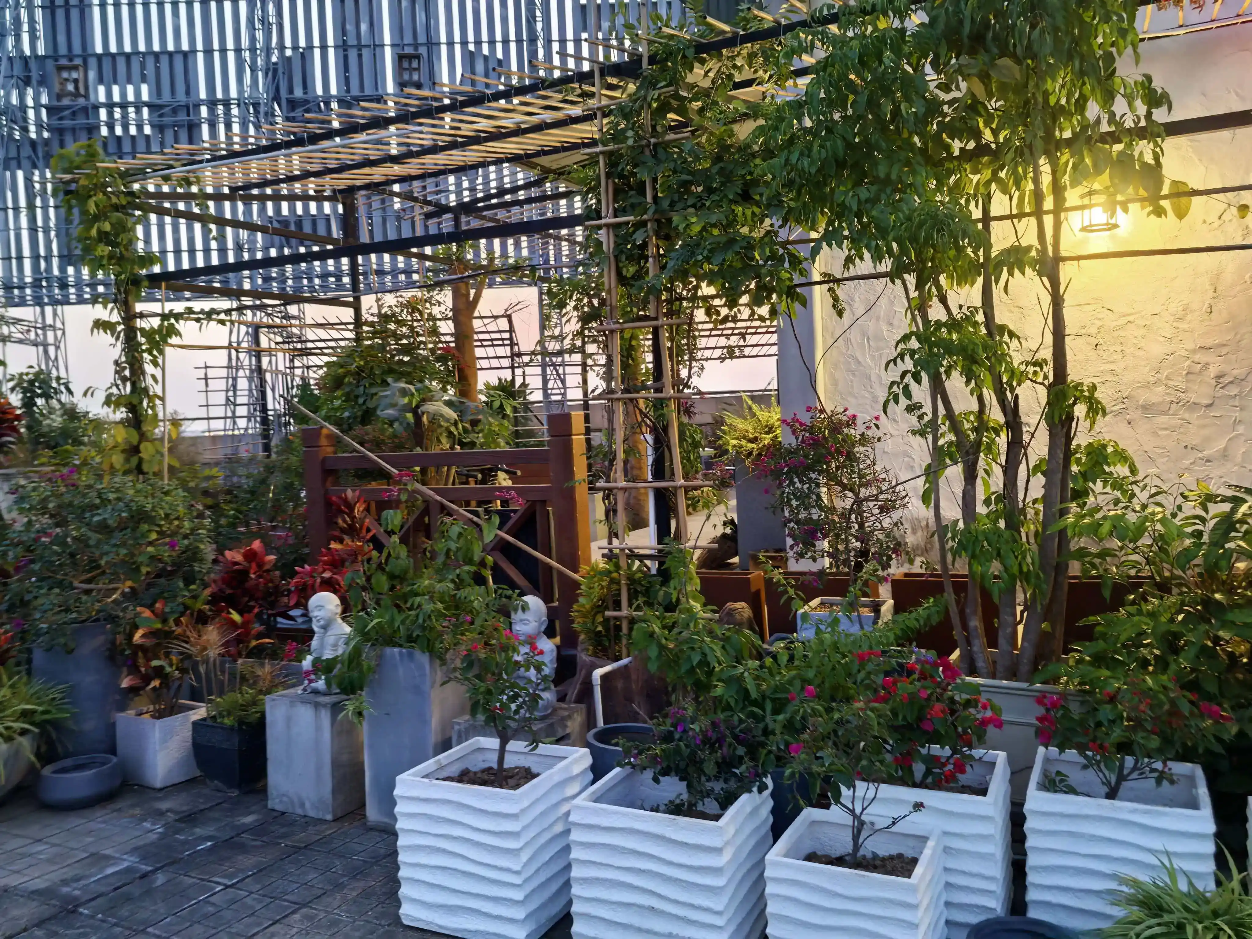 Large commercial GRC planters installed at the Changchun Garden corporate rooftop project, demonstrating lightweight structural benefits